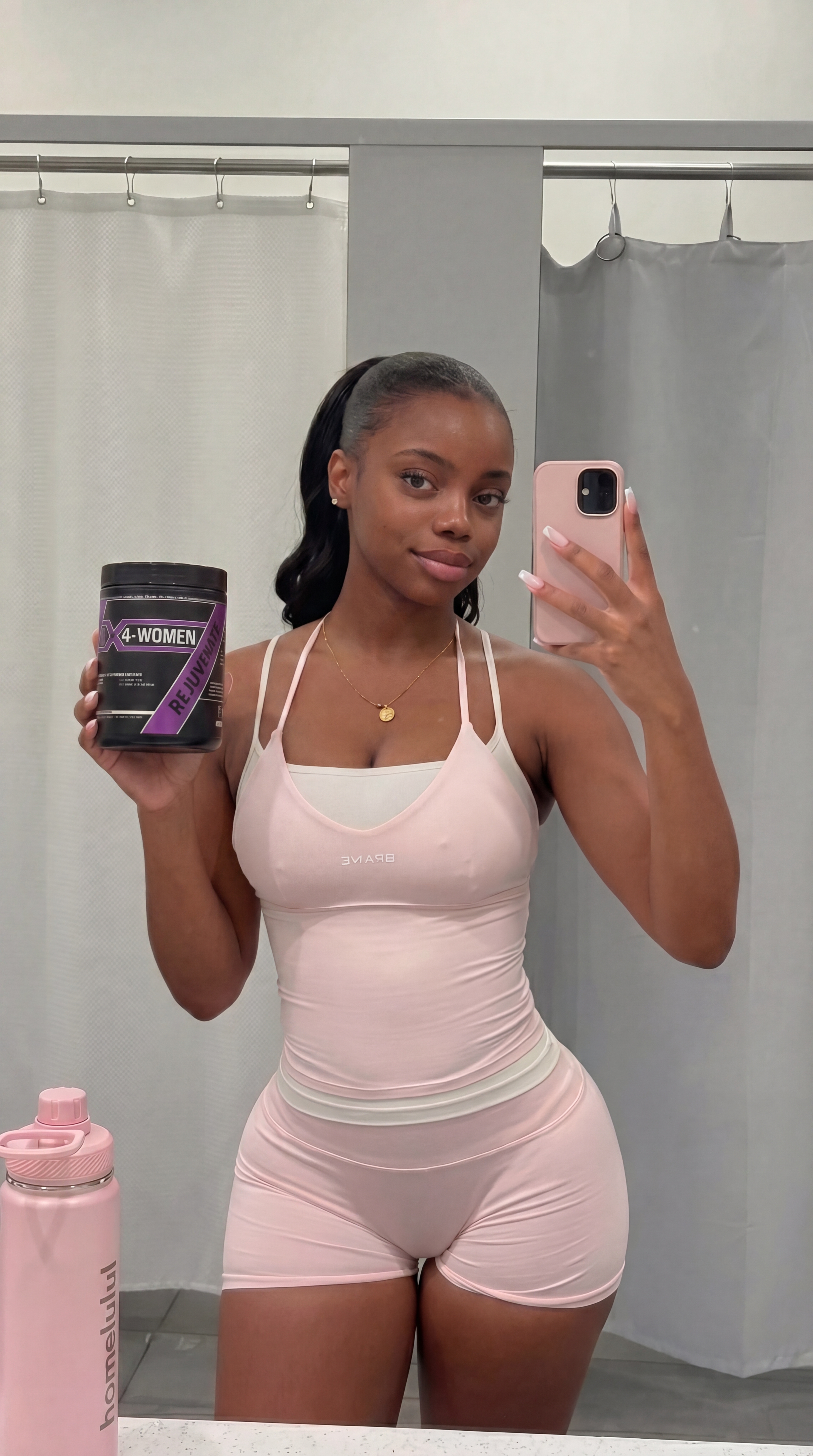 Model holding a supplement product